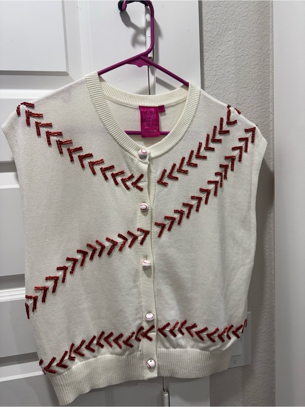 QUEEN OF SPARKLES Cream Sweater with Hot Pink Label Detail